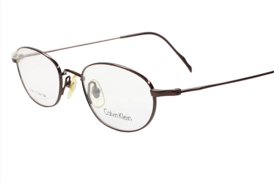 Calvin Klein CK517 090 Dark Bronze Titanium Vintage Luxury Eyeglasses -Wo Optical Frames ABC Optical Eyeglasses