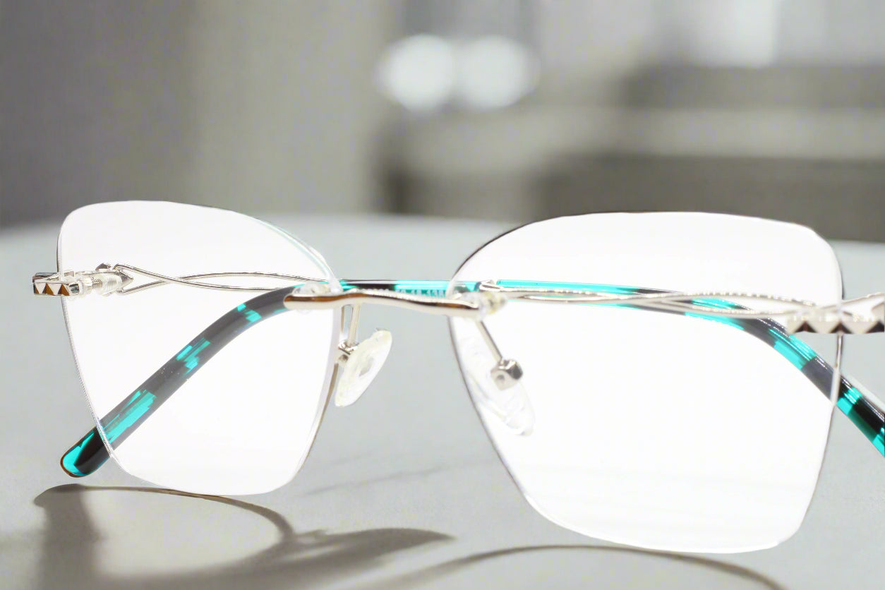 Myriad Eyewear ME25628 Silver Blue Tortoise Rimless Luxury Eyeglasses -Wo Optical Frames ABC Optical Eyeglasses