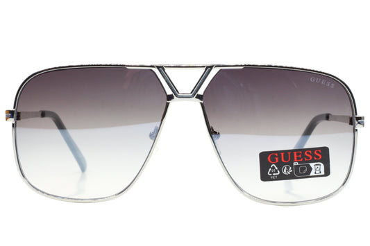Guess sunglasses with gradient lenses on a white background