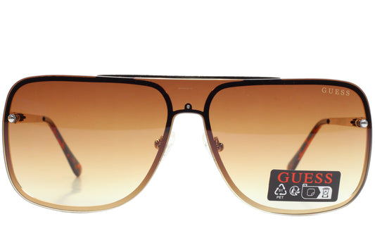 Guess sunglasses with a brown gradient lens on a white background