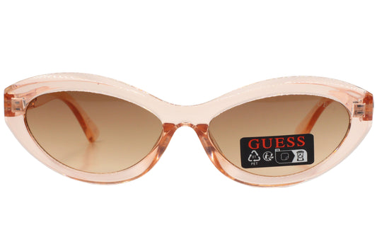 Guess Pink cat-eye sunglasses with brown lenses on a white background