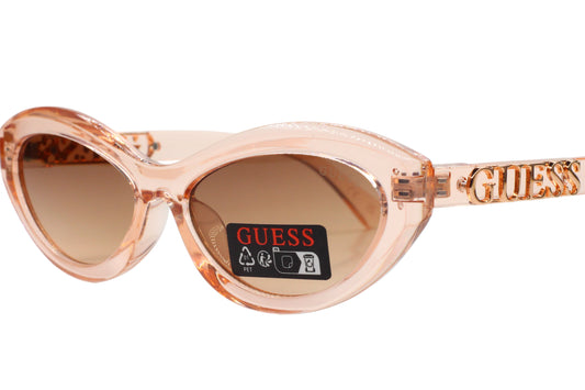 Pink Guess sunglasses on a white background