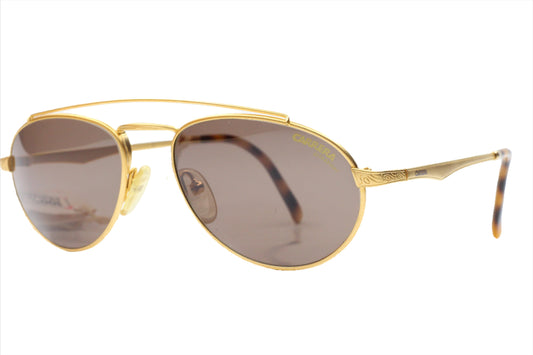 Carrera CA5519 vintage sunglasses with gold metal frame and brown tinted lenses by ABC Optical