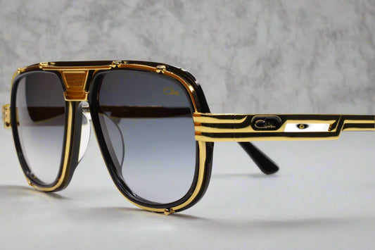 Cazal 665 sunglasses black gold with bold black and gold frame design by ABC Optical