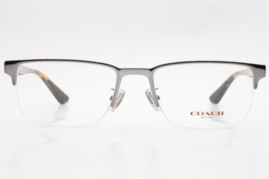 Men's Coach semi-rimless eyeglasses by ABC Optical with black metal frame and clear lenses