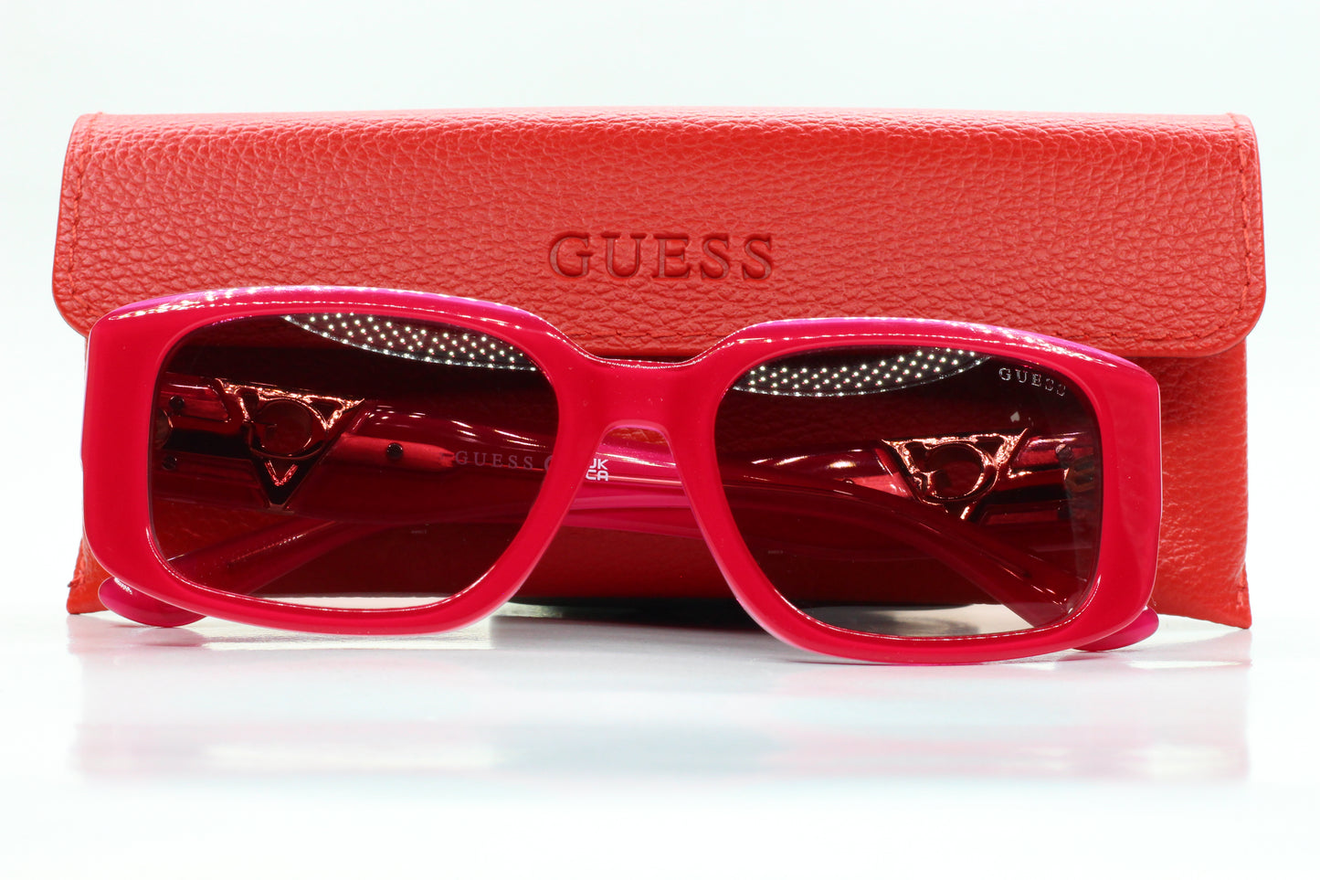 Guess pink gold sunglasses women in bold pink frame with red Guess case by ABC Optical