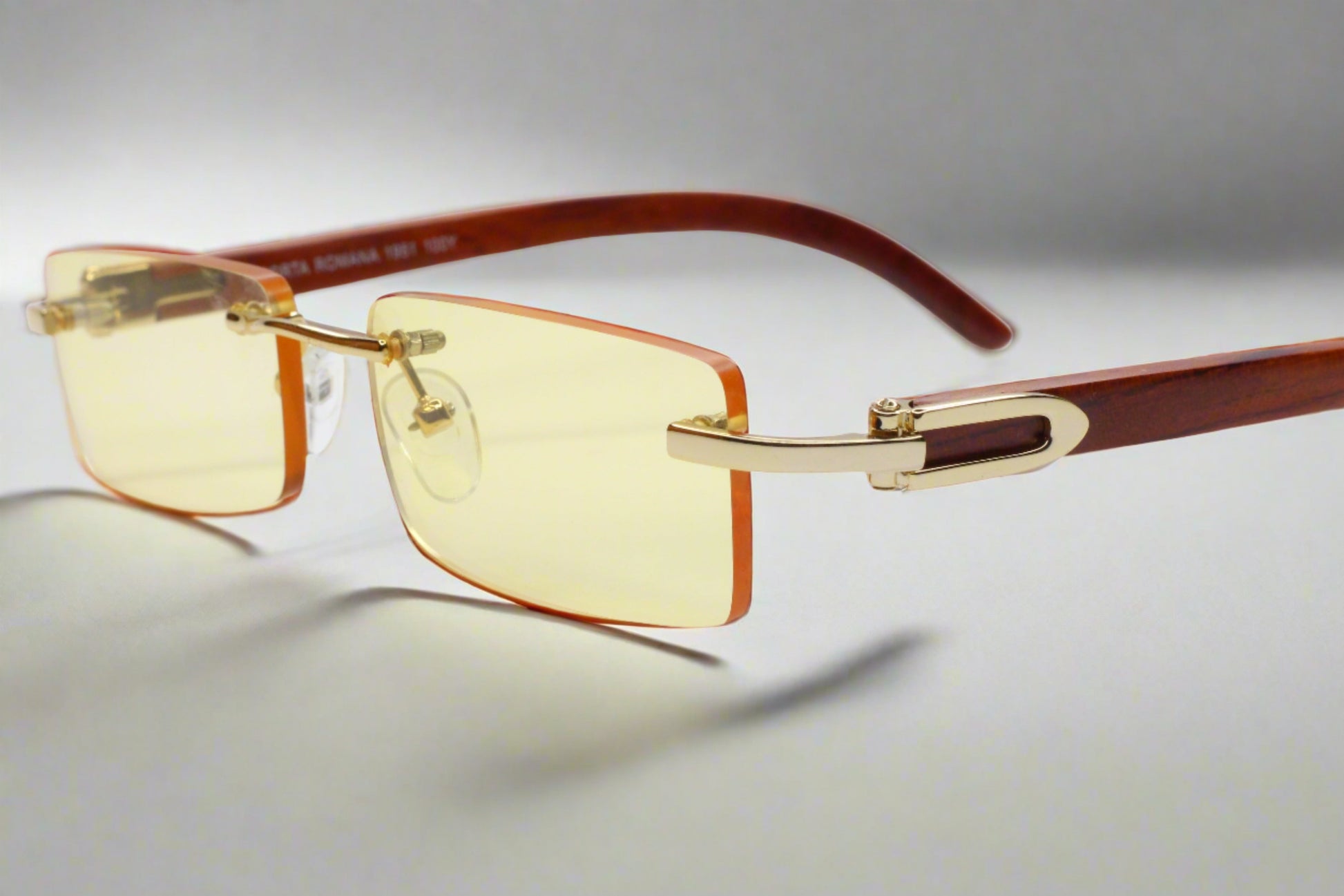 PORTA ROMANA 1951 100Y GOLD & WOOD Yellow Tint Rimless Sunglasses -Ma Optical Frames ABC Optical sunglasses