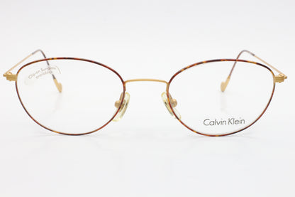 VINTAGE CALVIN KLEIN CK 323 522 GOLD TORTOISE JAPAN EYEGLASSES 50-18-145 Gold Tortoise Titanium Optical Frames ABC Optical Inc (NY) Eyeglasses