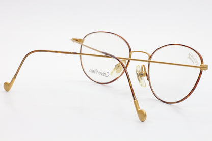 VINTAGE CALVIN KLEIN CK 323 522 GOLD TORTOISE JAPAN EYEGLASSES Optical Frames ABC Optical Inc (NY) Eyeglasses