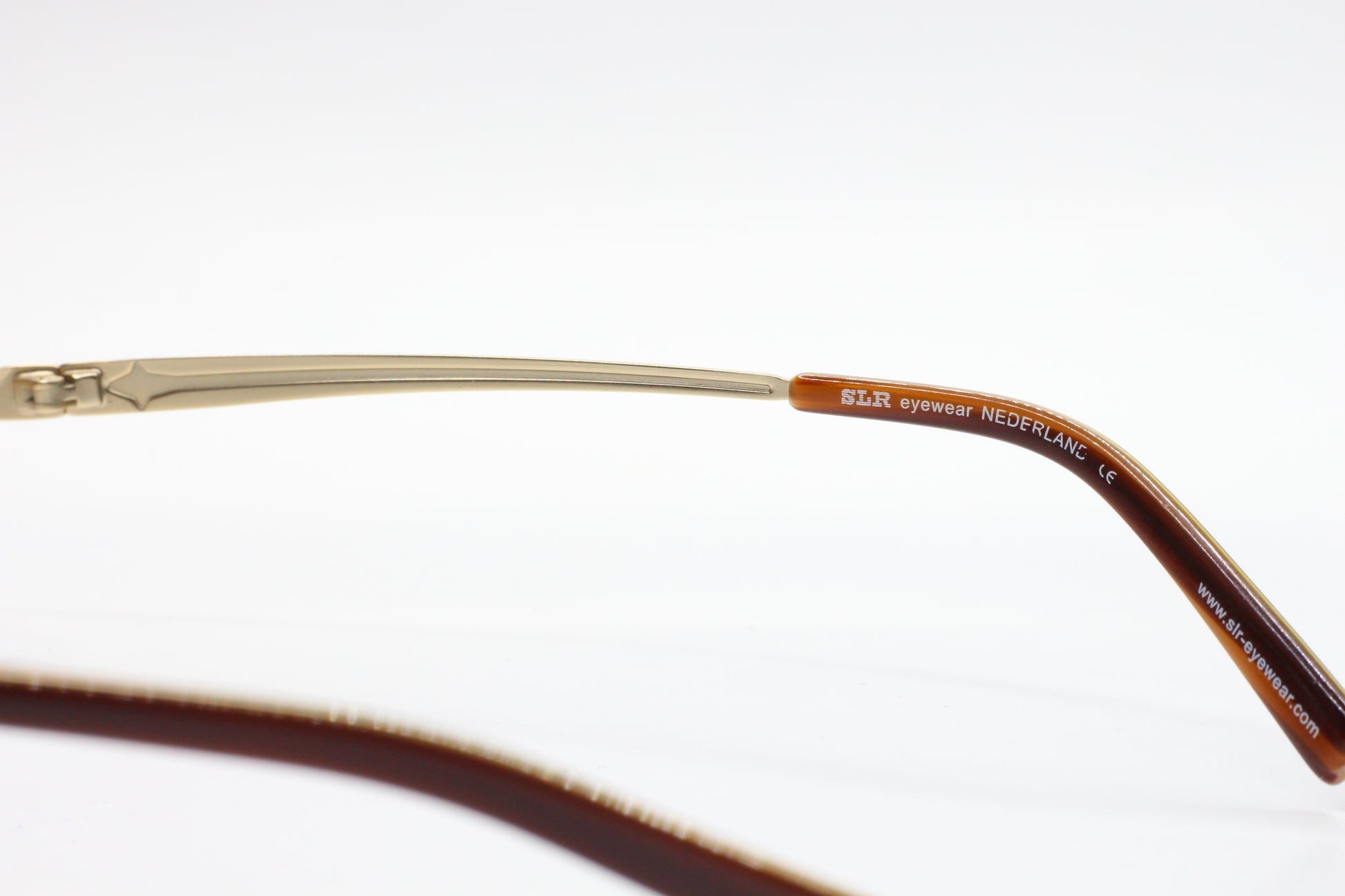 SLR Eyewear Mod.720 C3 Gold Rimless Nederland Designer Eyeglasses Optical Frames ABC Optical Eyeglasses