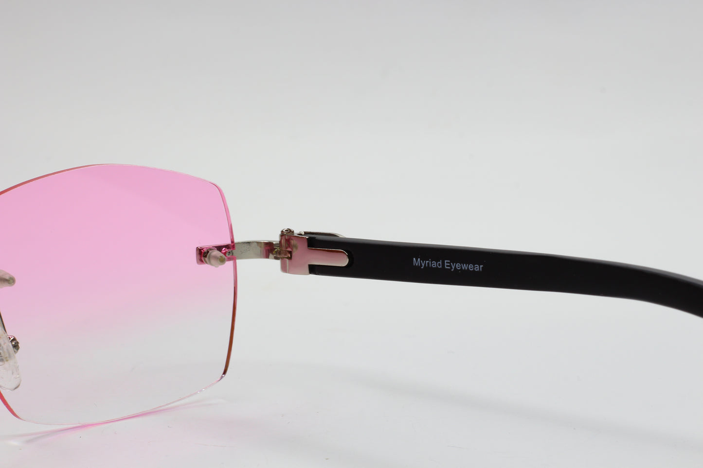 Myriad Eyewear ME00520 Pink Cloud Silver Rimless Designer Luxury Sunglasses Optical Frames ABC Optical sunglasses