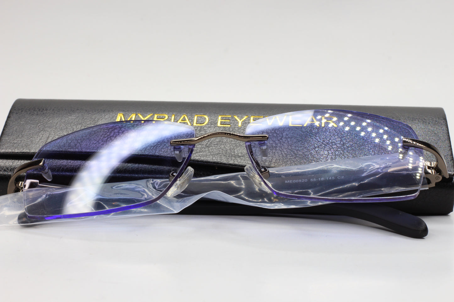 Myriad Eyewear ME00528 Purple Gunmetal Gradient Rimless Luxury Sunglasses Optical Frames ABC Optical sunglasses