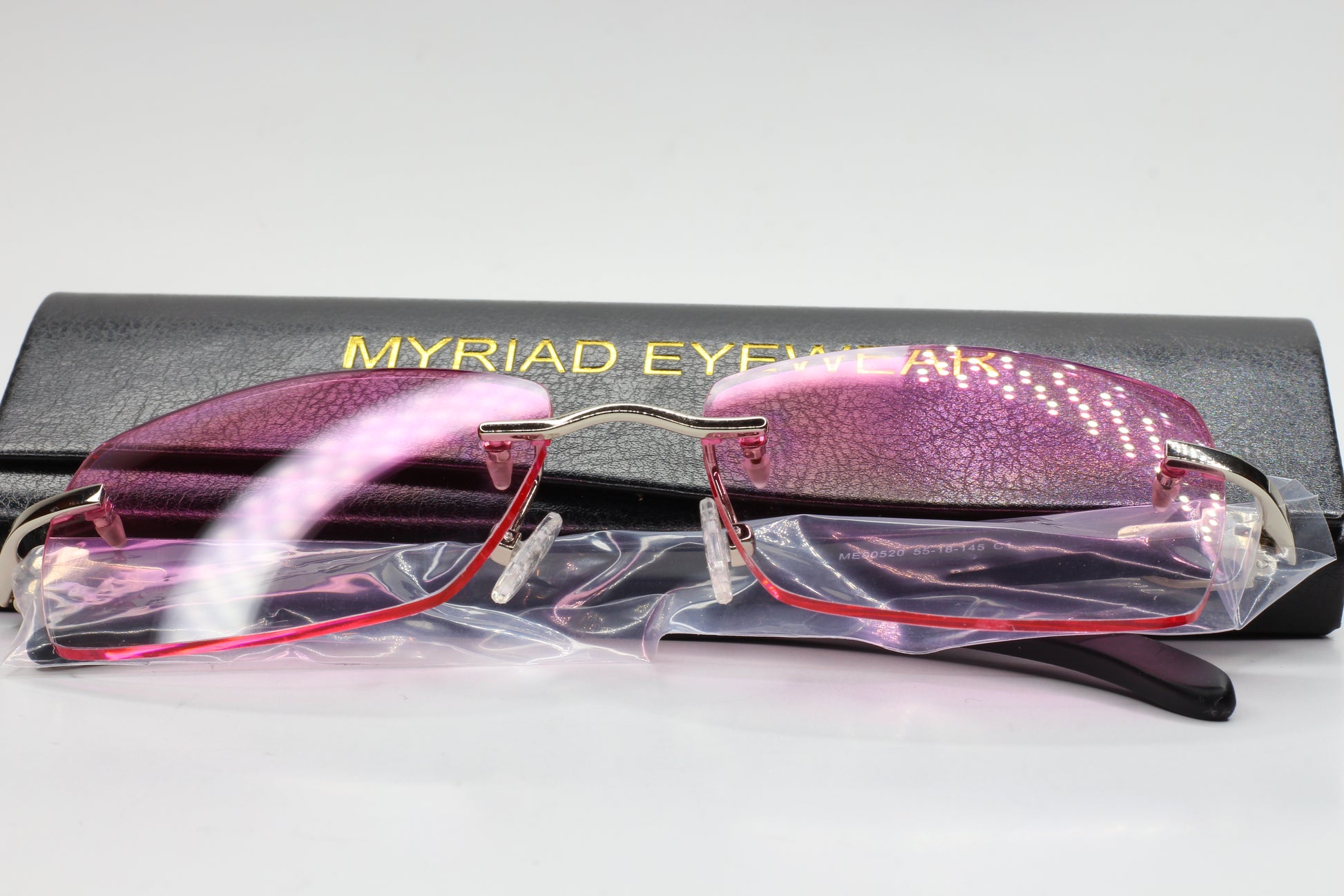 Myriad Eyewear ME00520 Pink Cloud Silver Rimless Designer Luxury Sunglasses Optical Frames ABC Optical sunglasses