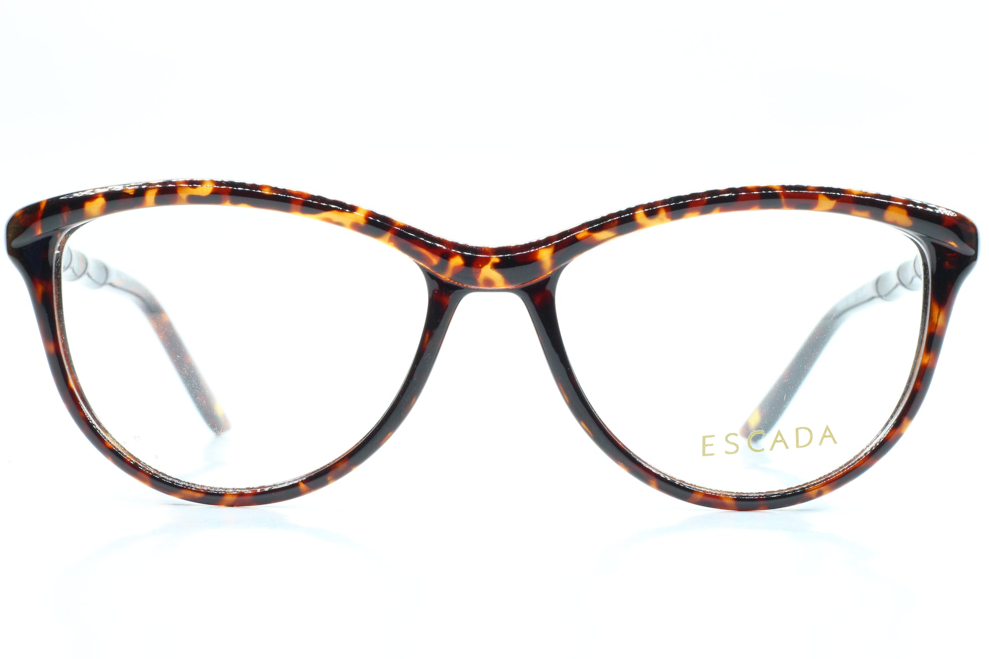 Tortoiseshell glasses with 'Escada' logo on a white background