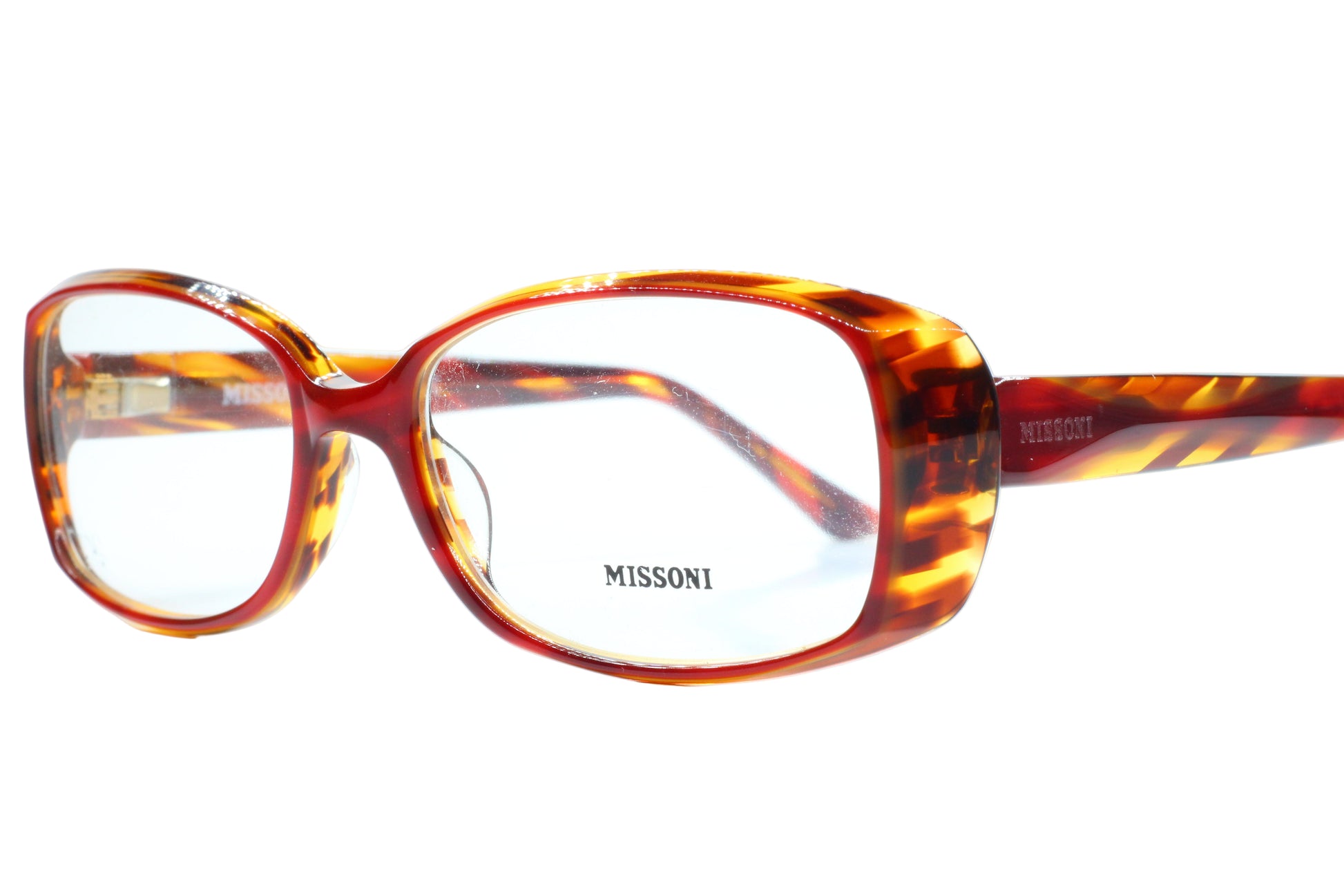 Tortoiseshell glasses with 'Missoni' branding on a white background