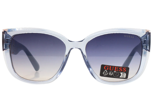 Guess sunglasses with clear frame and gradient lenses on a white background
