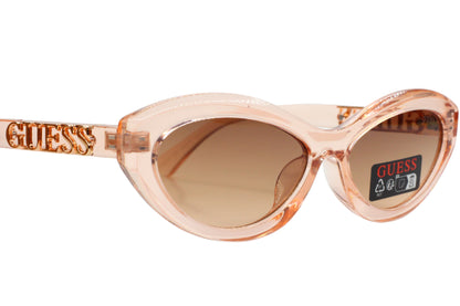 Guess sunglasses with pink frame and brown lenses on a white background