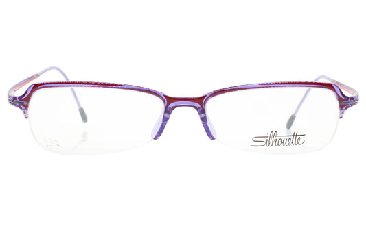 Purple eyeglasses on a white background with 'Silhouette' branding.