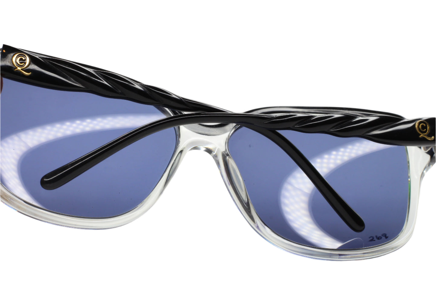 ABC Optical AMQ4149S K4X/KU sunglasses sale with black twisted arms and clear frame blue lenses