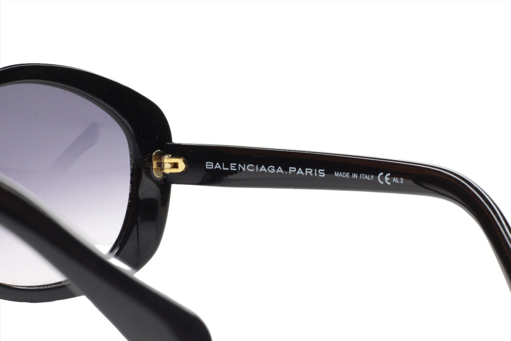 Close-up of black Balenciaga BAL0127S sunglasses online showing frame detail and branding