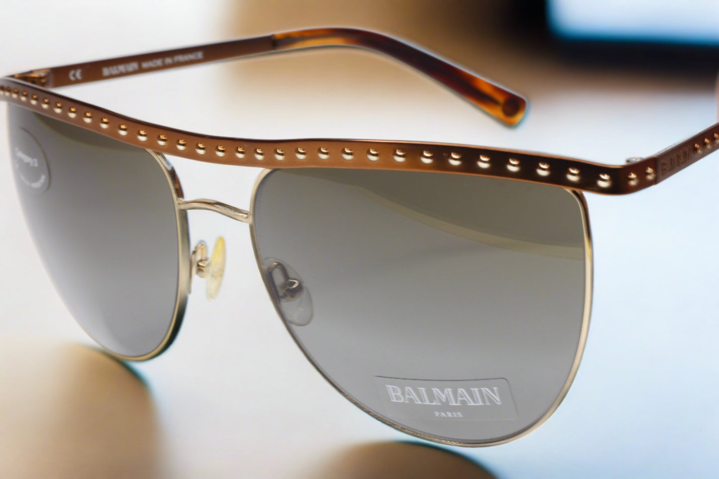 Balmain BL2000 02 sunglasses for sale featuring metal optical frames with brown detailing from ABC Optical