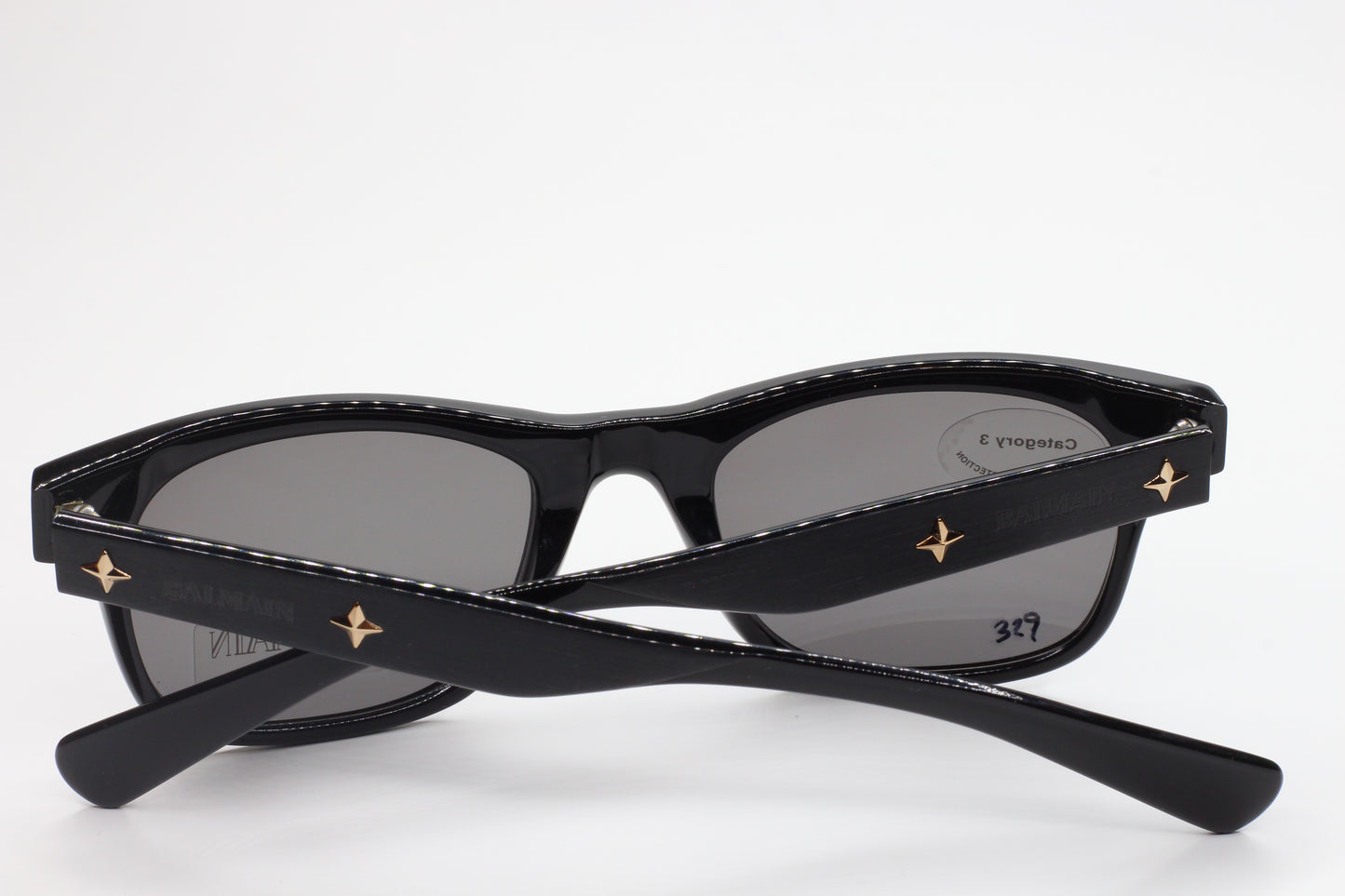 Balmain BL4002 sunglasses black optical frames with gold star accents by ABC Optical