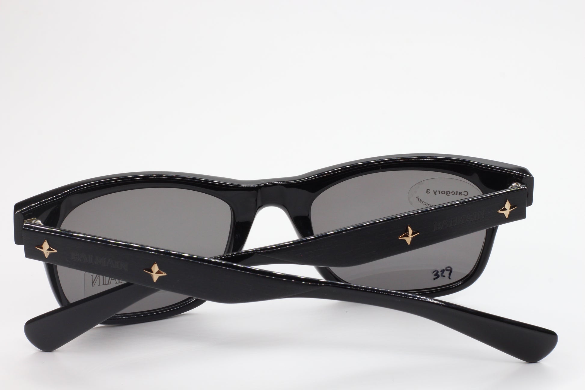 Balmain BL4002 sunglasses black optical frames with gold star accents by ABC Optical