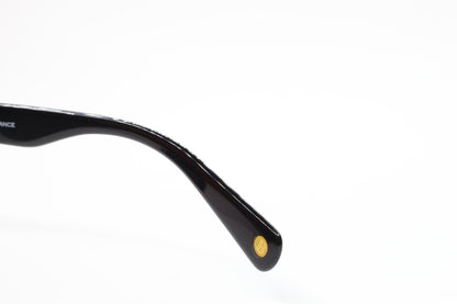 Close-up view of black temple arm detail of Balmain BL4002 sunglasses from ABC Optical