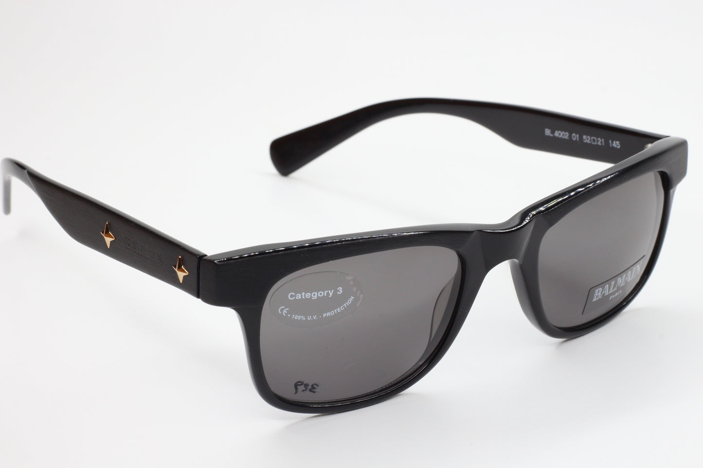 Balmain BL4002 sunglasses black optical frames by ABC Optical with dark lenses and star details on temples