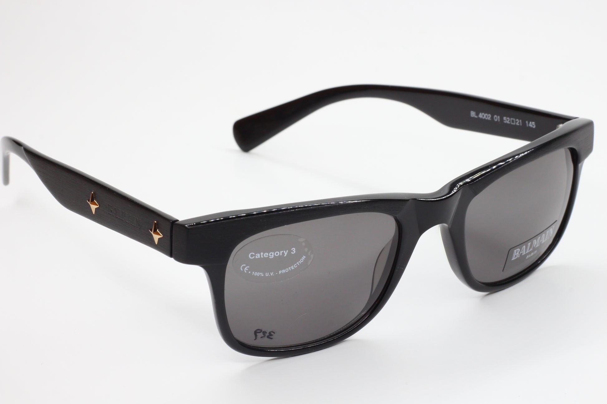 Balmain BL4002 sunglasses black optical frames by ABC Optical with dark lenses and star details on temples