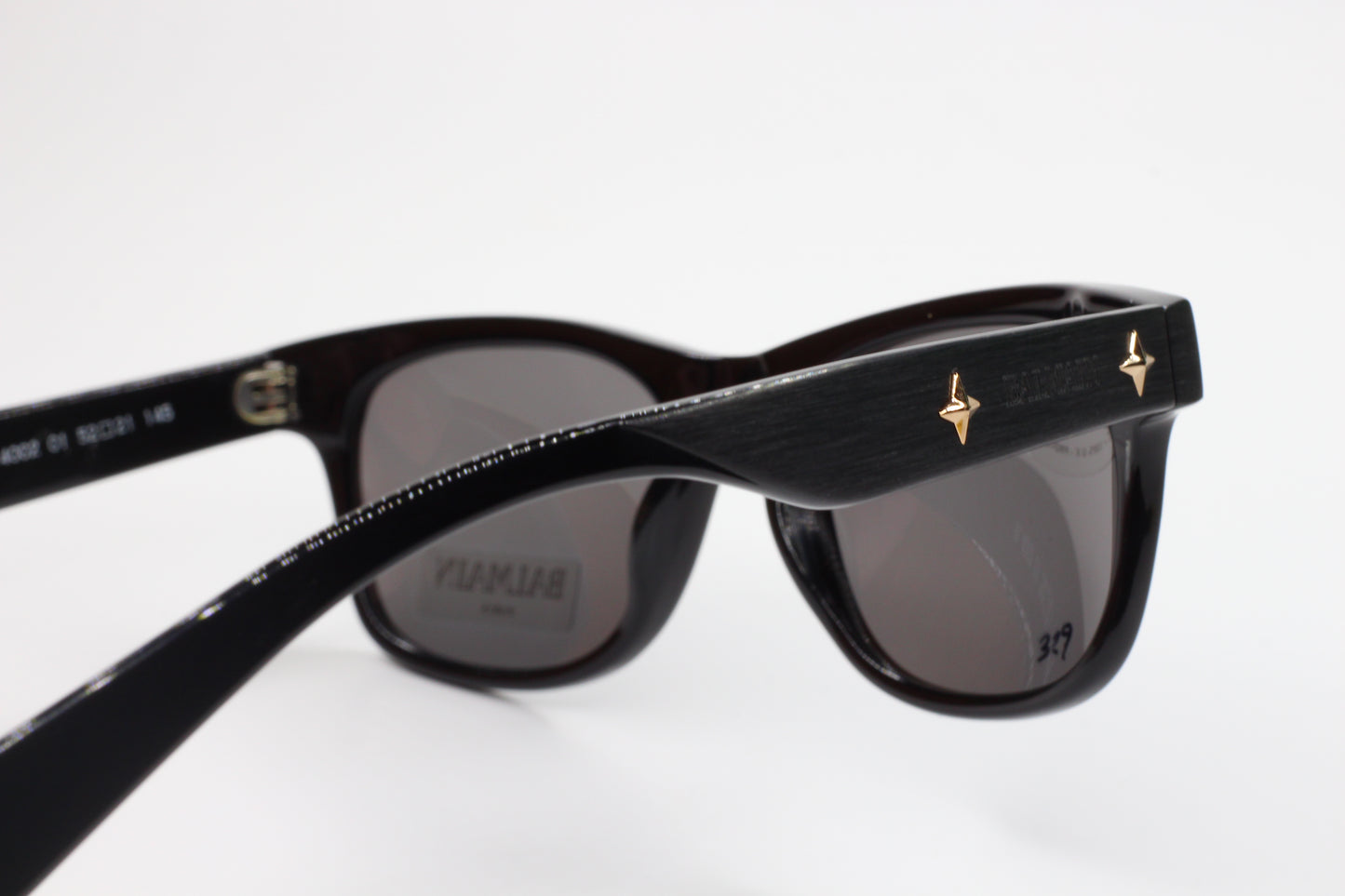Balmain BL4002 sunglasses black optical frames with gold star accents from ABC Optical