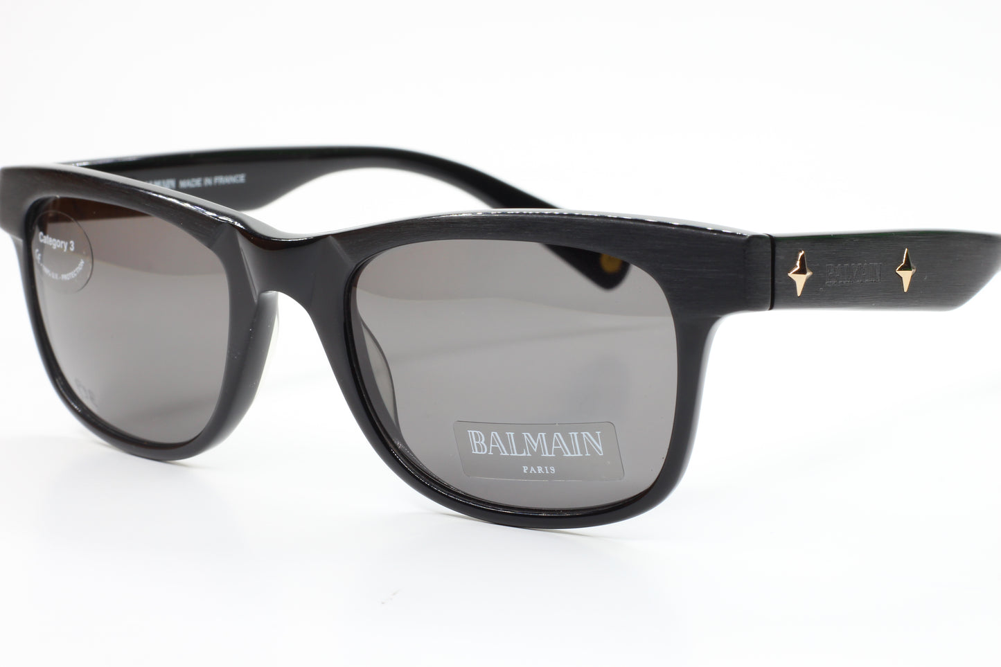 Balmain BL4002 sunglasses black optical frames with dark lenses and gold accents by ABC Optical