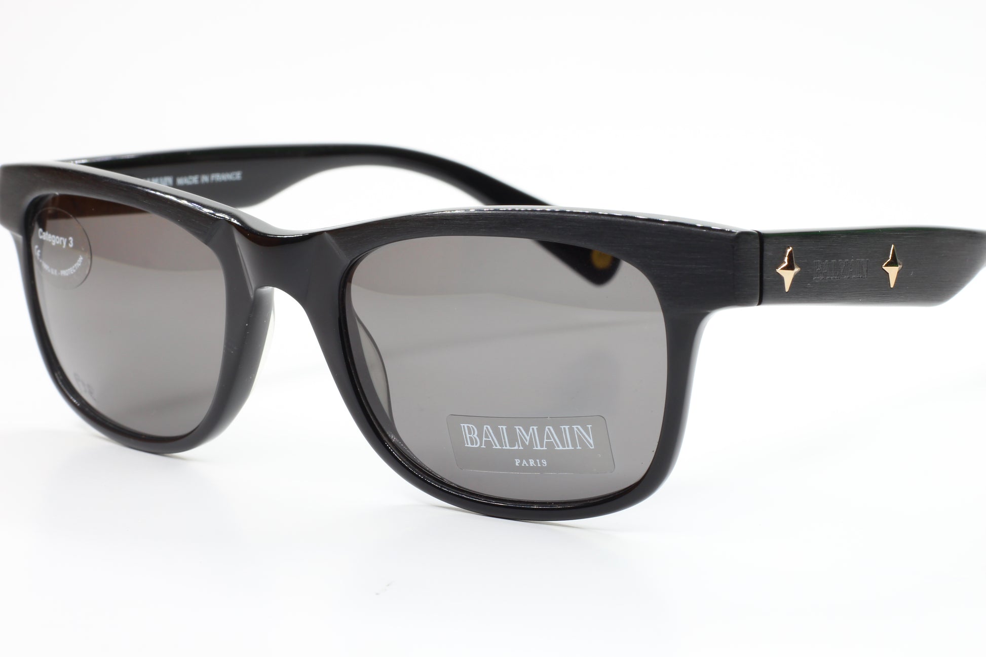Balmain BL4002 sunglasses black optical frames with dark lenses and gold accents by ABC Optical