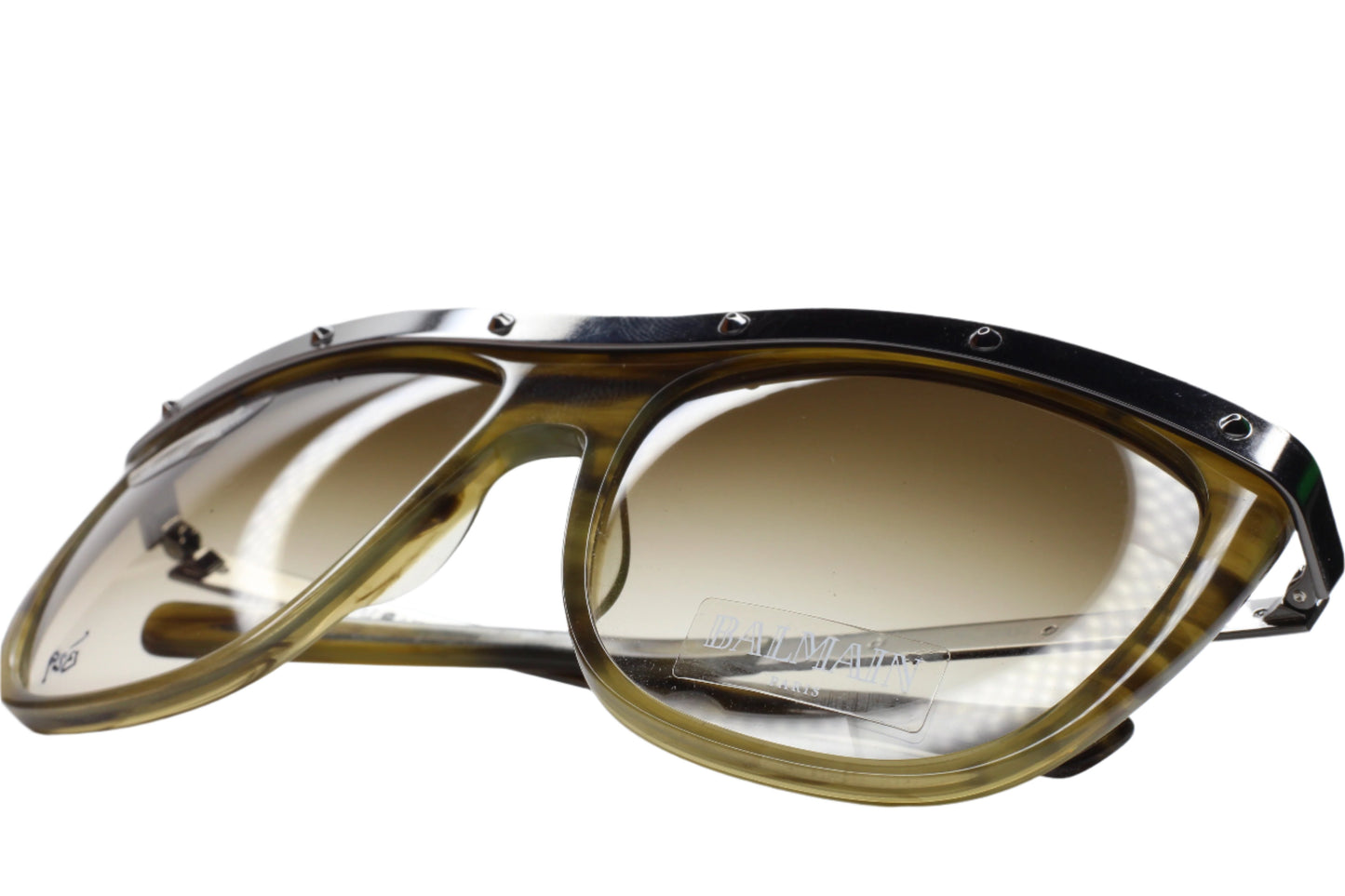 Balmain Paris khaki horn sunglasses with metal rim and tinted lenses from ABC Optical