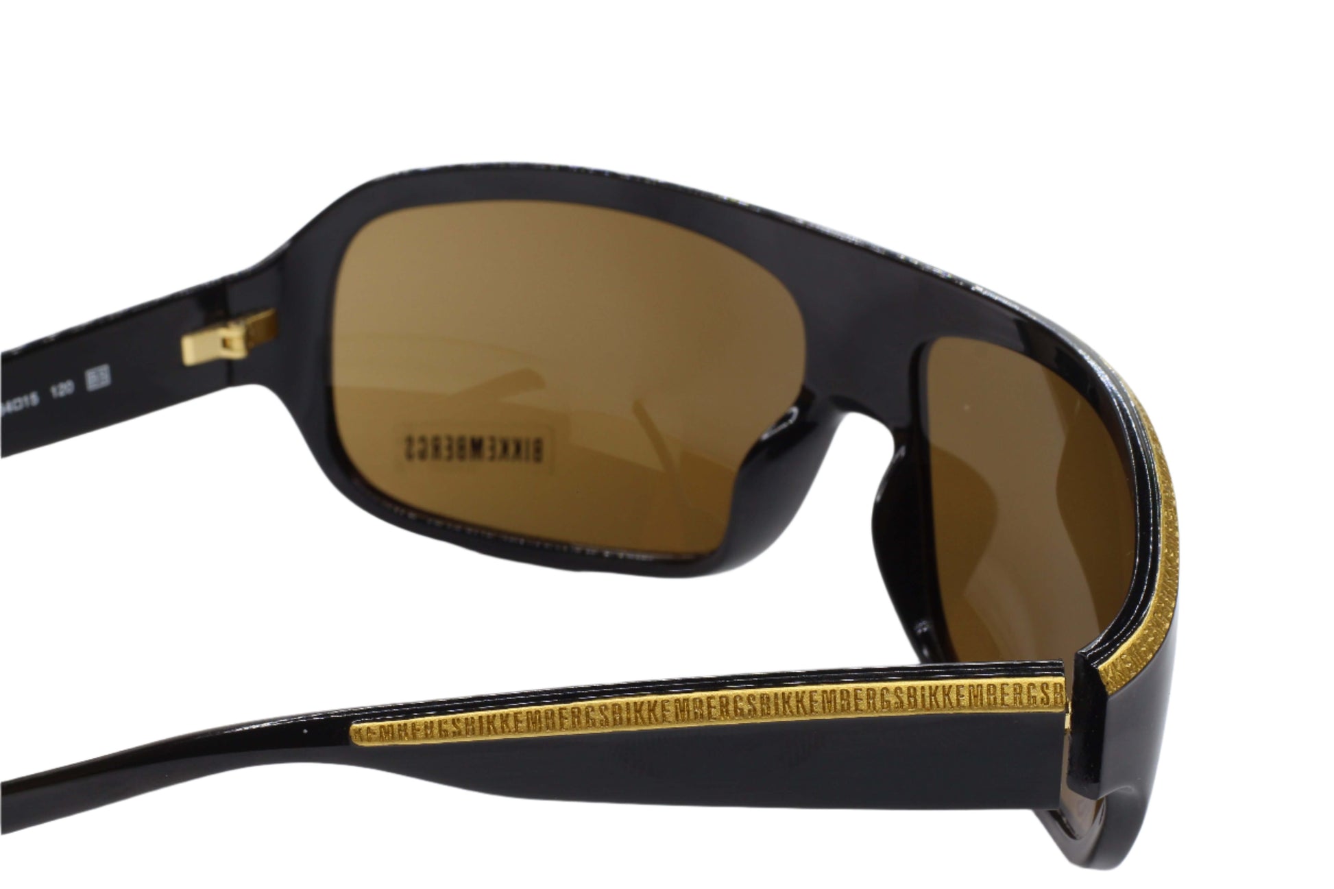 Bikkembergs luxury sunglasses by ABC Optical with black frame and brown lenses featuring gold detailing