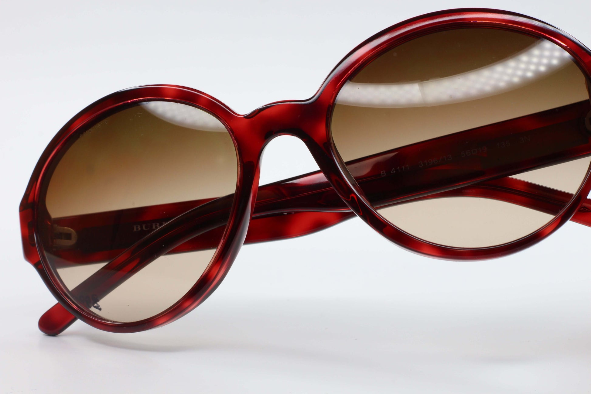 ABC Optical Burberry B4111 3196 13 sunglasses sale featuring round red frames with brown lenses