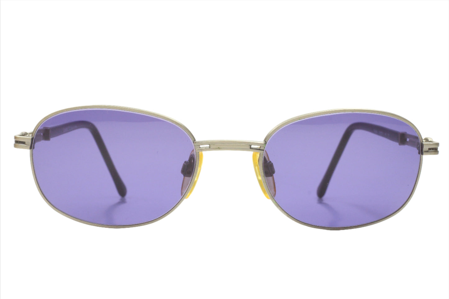 CH804 PD520 Carolina Herrera sunglasses with oval purple lenses and silver metal frames from ABC Optical