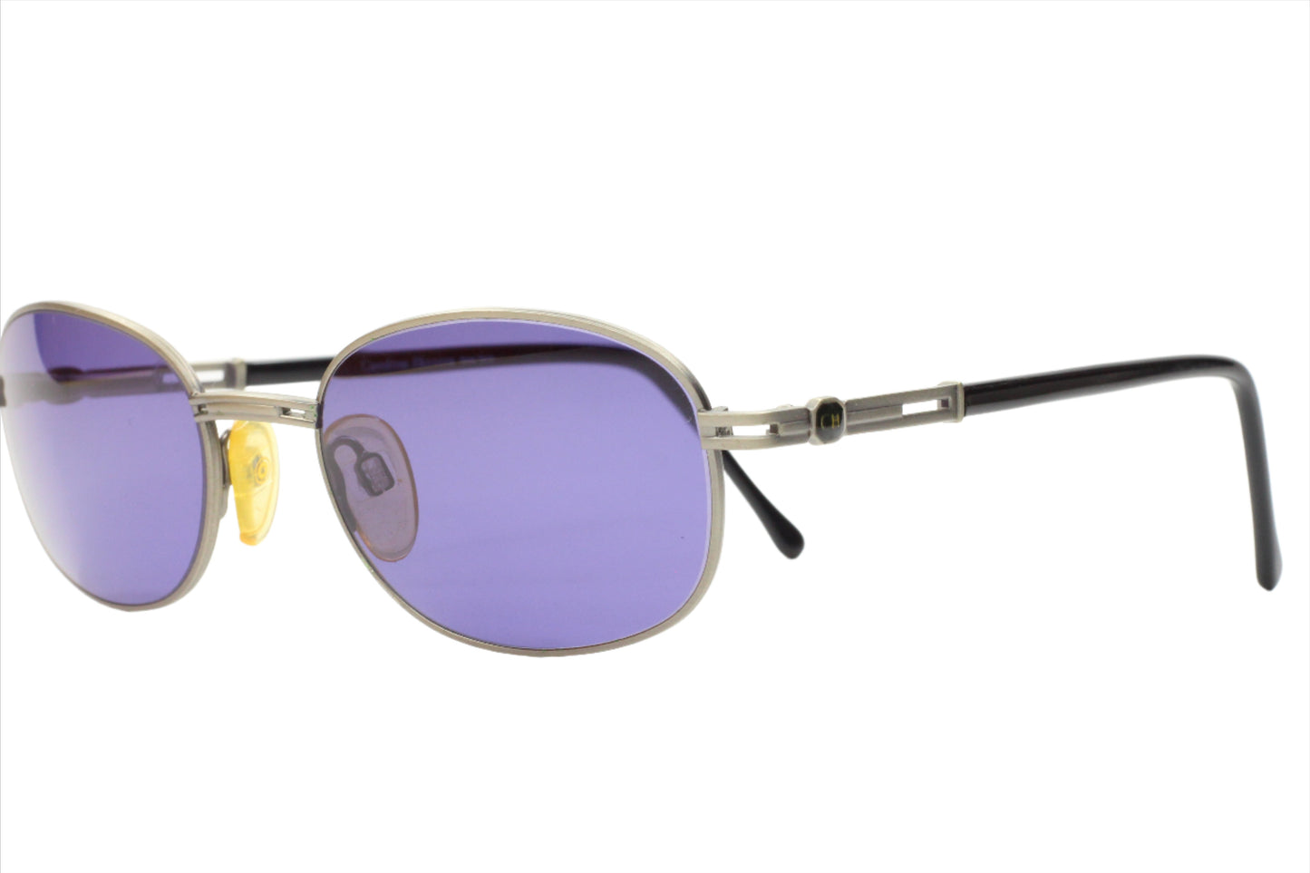 CH804 PD520 Carolina Herrera sunglasses by ABC Optical with purple lenses and metal frame