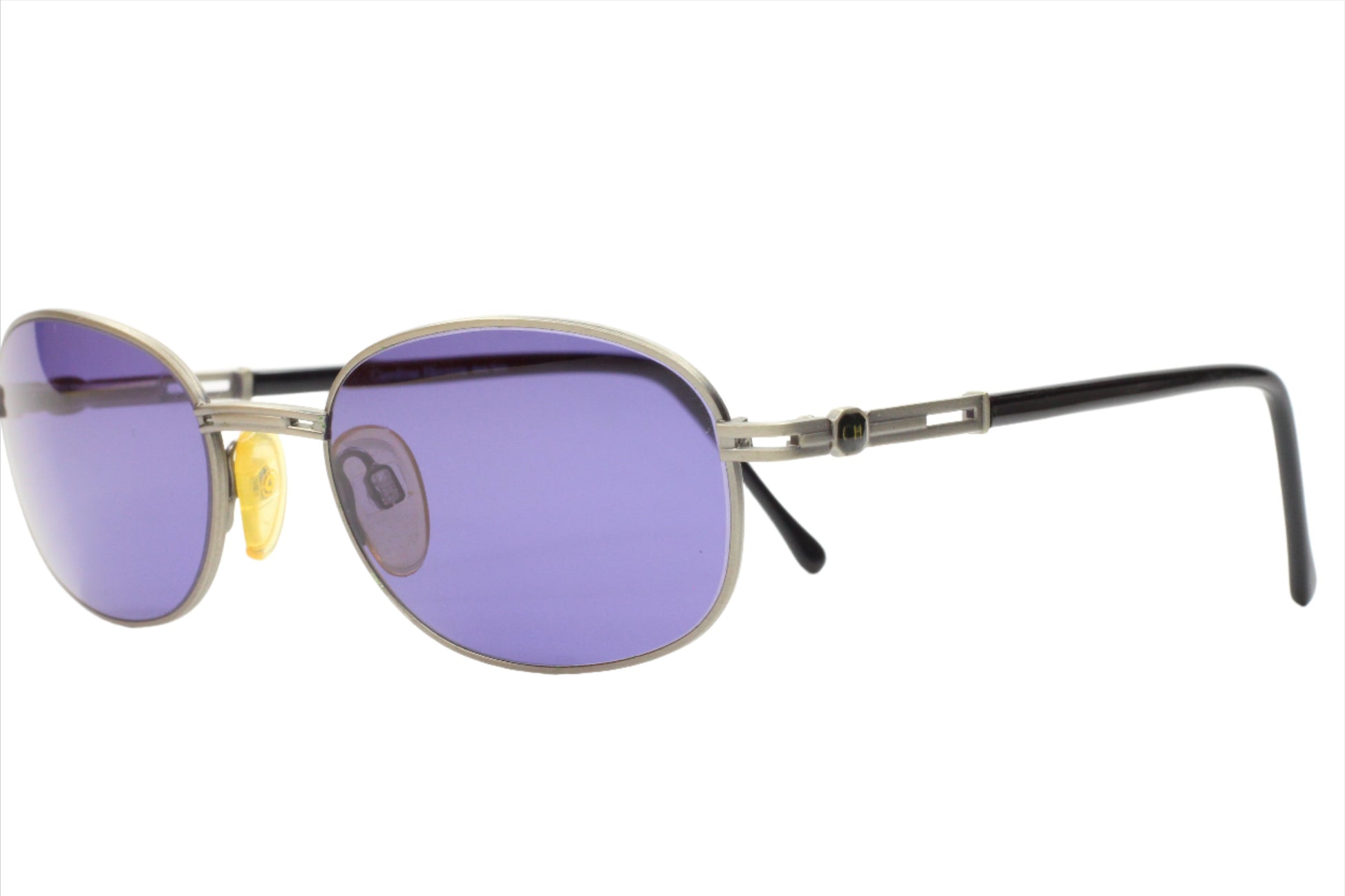 CH804 PD520 Carolina Herrera sunglasses by ABC Optical with purple lenses and metal frame