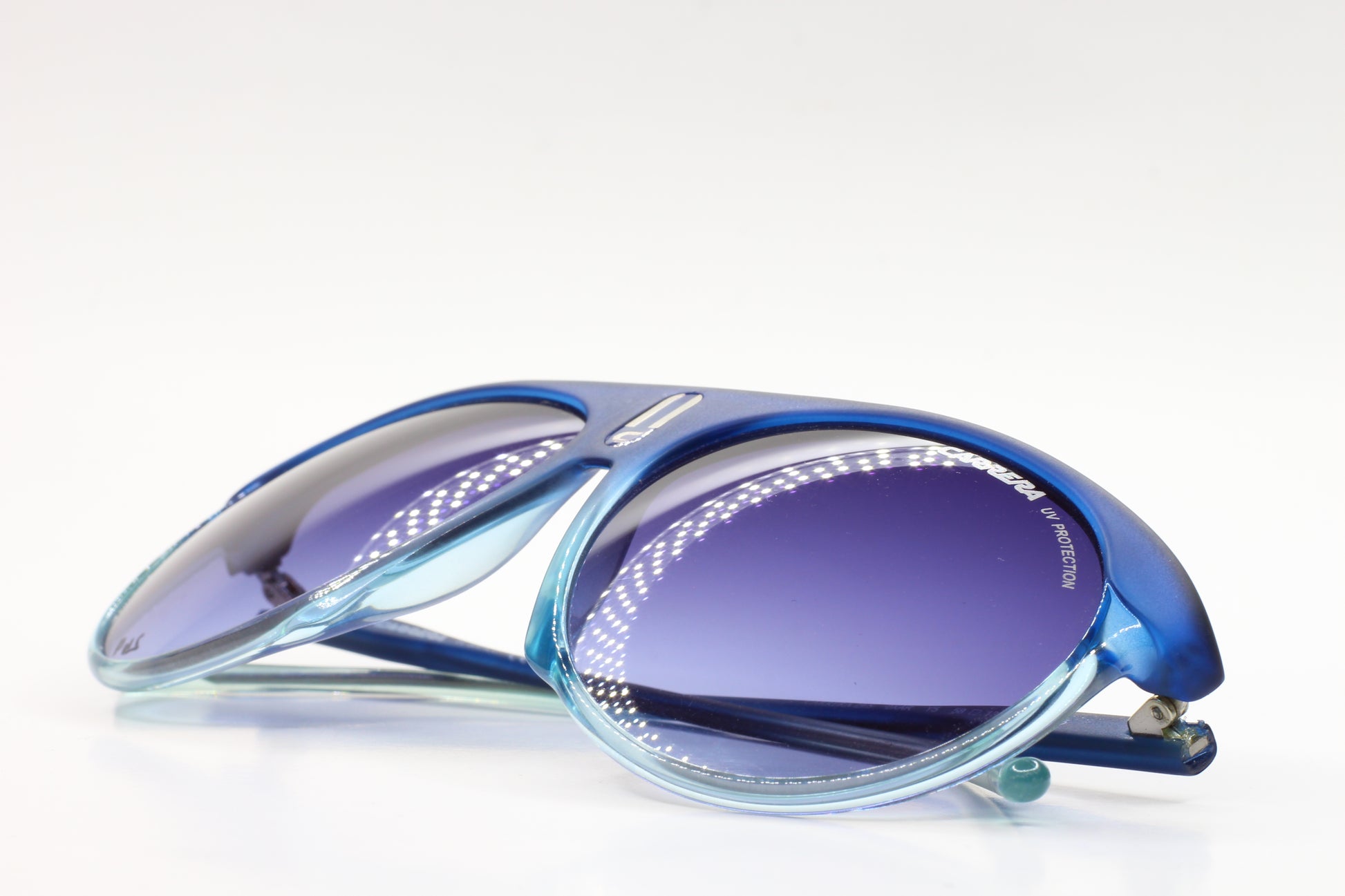 Blue Carrera 0XAR Y5 sunglasses online with gradient lenses and sleek curved optical frames