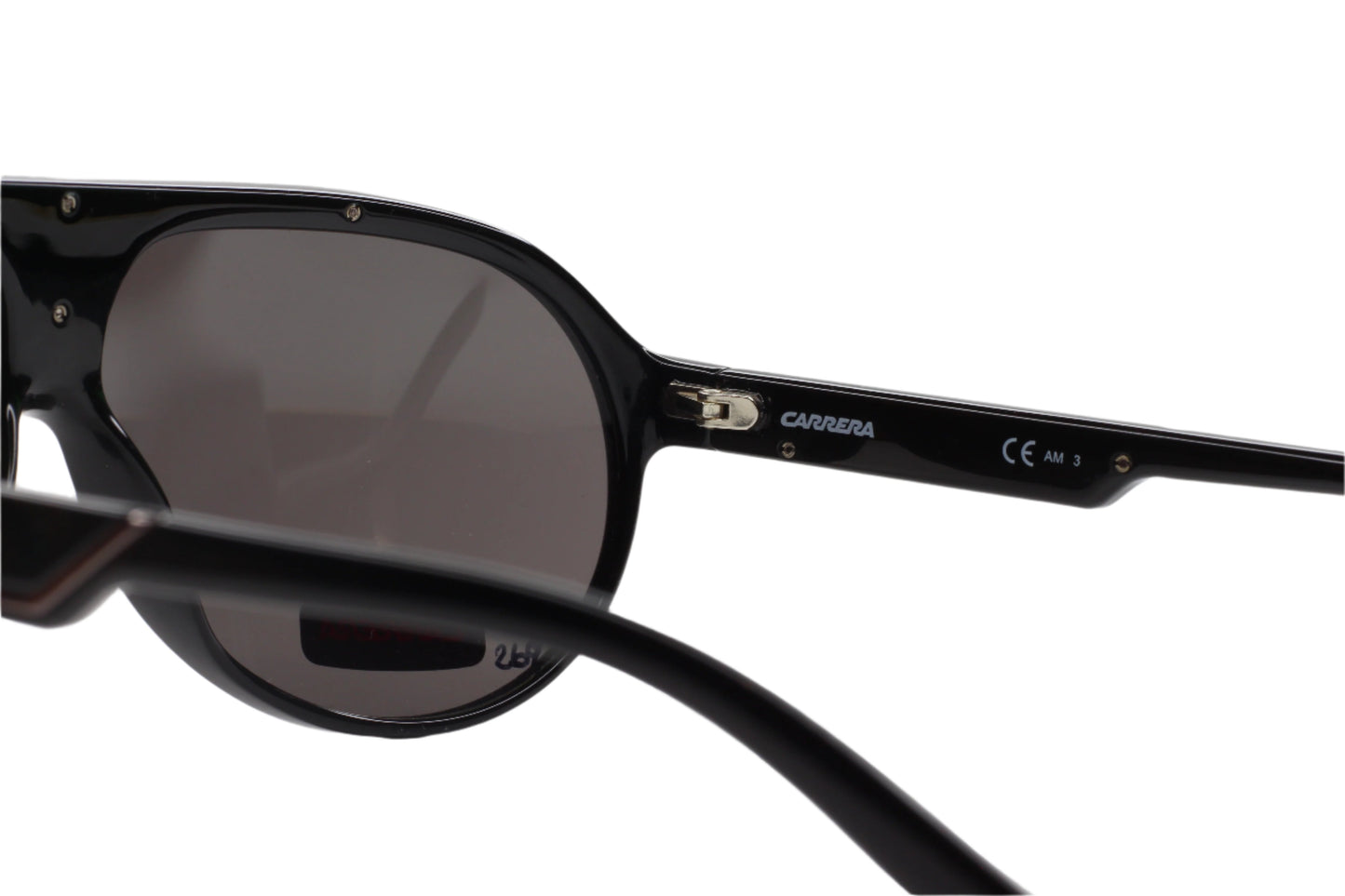 Close-up of Carrera 57 black aviator sunglasses showcasing sleek black frame and tinted lenses