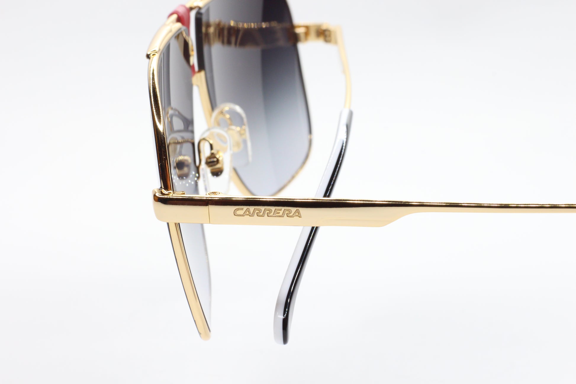 Gold Carrera sunglasses with gradient lenses close-up detail buy Carrera sunglasses online