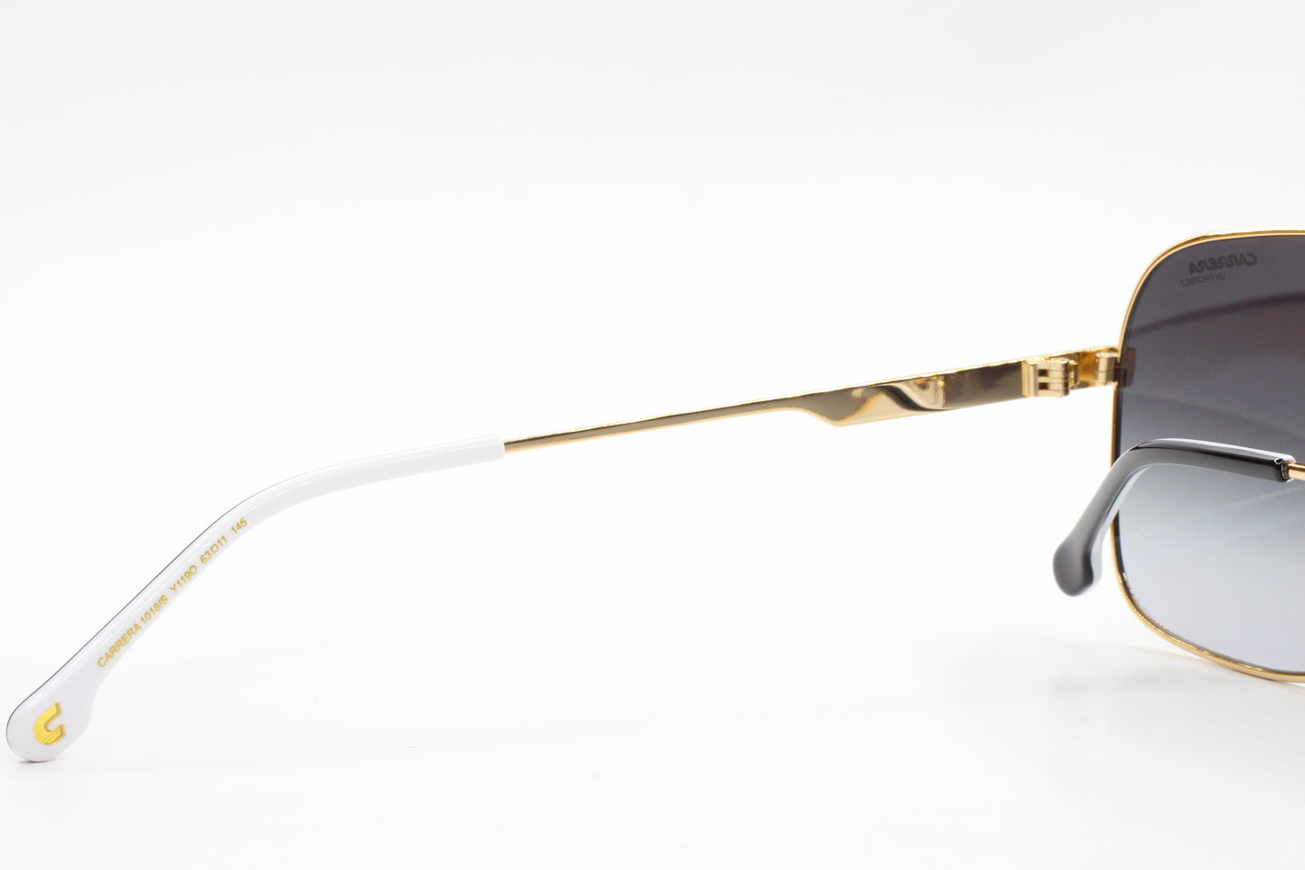 ABC Optical gold and white Carrera sunglasses frame detail with gray lenses buy Carrera sunglasses online