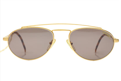 Carrera CA5519 vintage sunglasses with gold metal frame and tinted brown lenses from ABC Optical