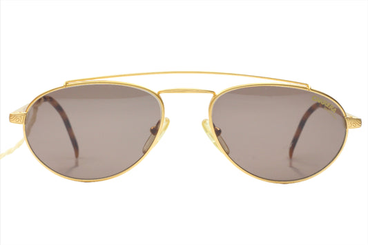 Carrera CA5519 vintage sunglasses with gold metal frame and tinted brown lenses from ABC Optical