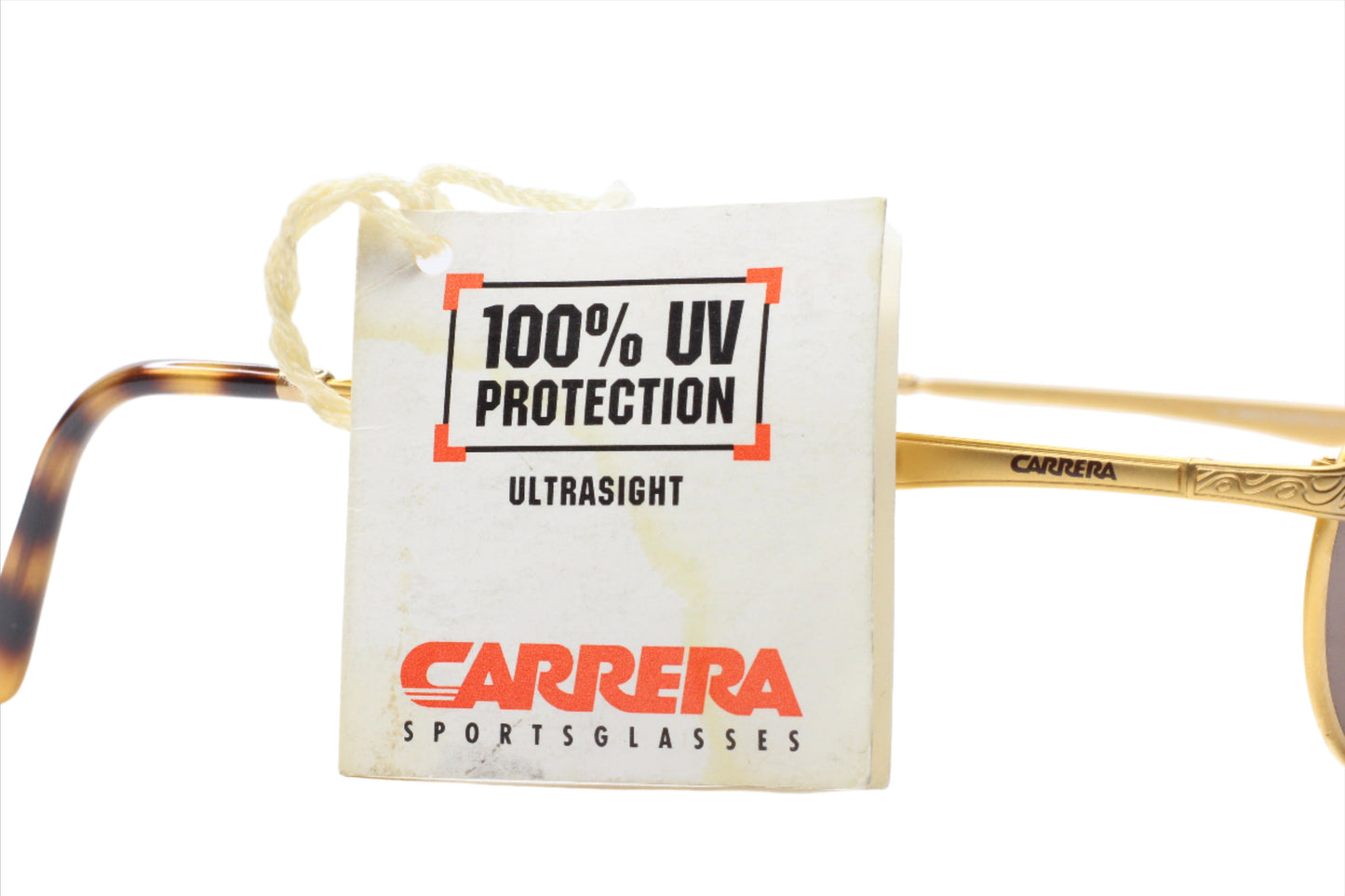 Carrera CA5519 vintage sunglasses tag showing 100 percent UV protection and Carrera branding