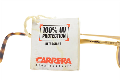 Carrera CA5519 vintage sunglasses tag showing 100 percent UV protection and Carrera branding