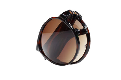 Carrera Champion brown designer sunglasses folded showing tortoiseshell optical frames by ABC Optical