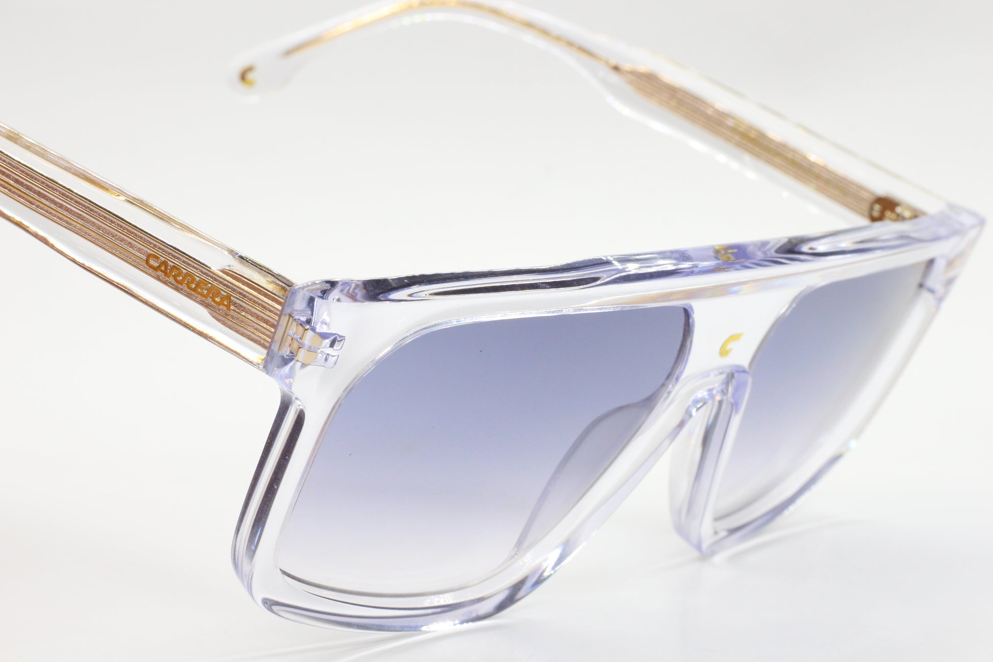 Luxury gradient sunglasses for men with clear acetate frame and light brown temples by ABC Optical
