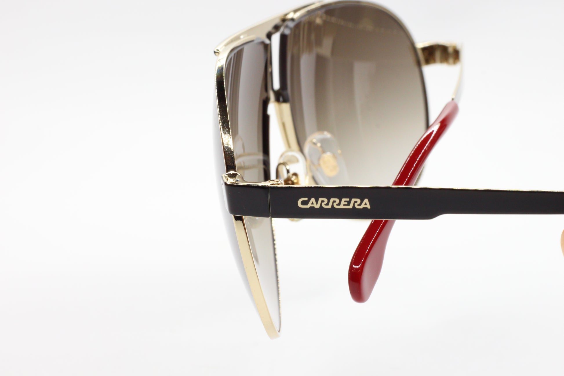 ABC Optical luxury silver black gradient sunglasses with sleek black arms and red temple tips